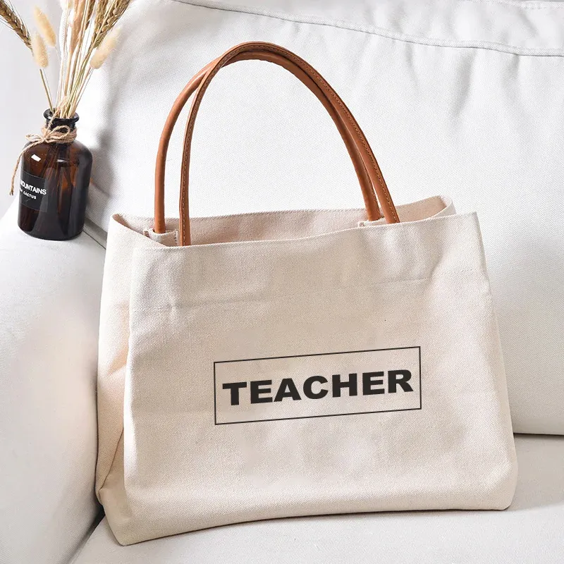 White canvas bag with leather handle